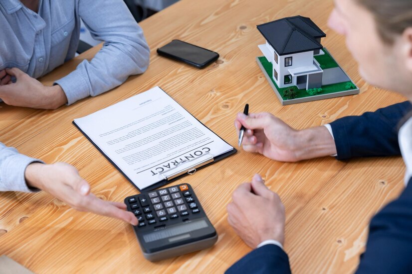 real-estate-agent-calculating-tax-interest-with-calculator-entity_31965-151069
