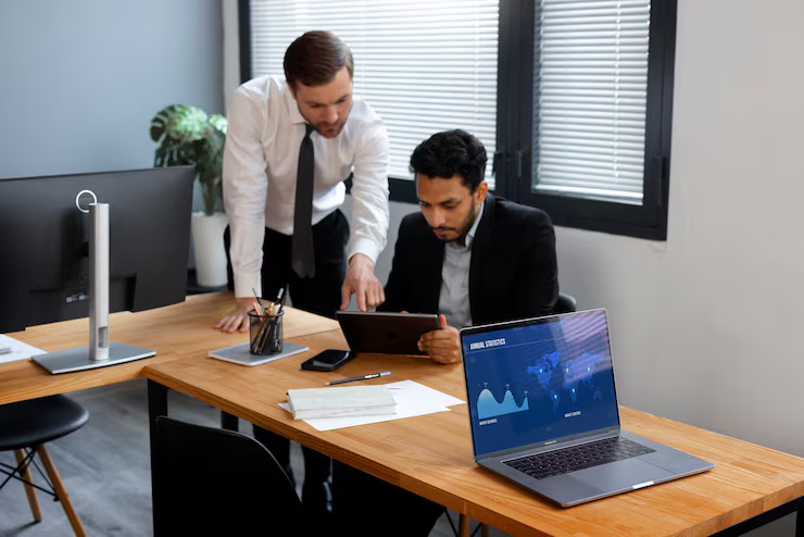 business-person-looking-finance-graphs_23-2150461314